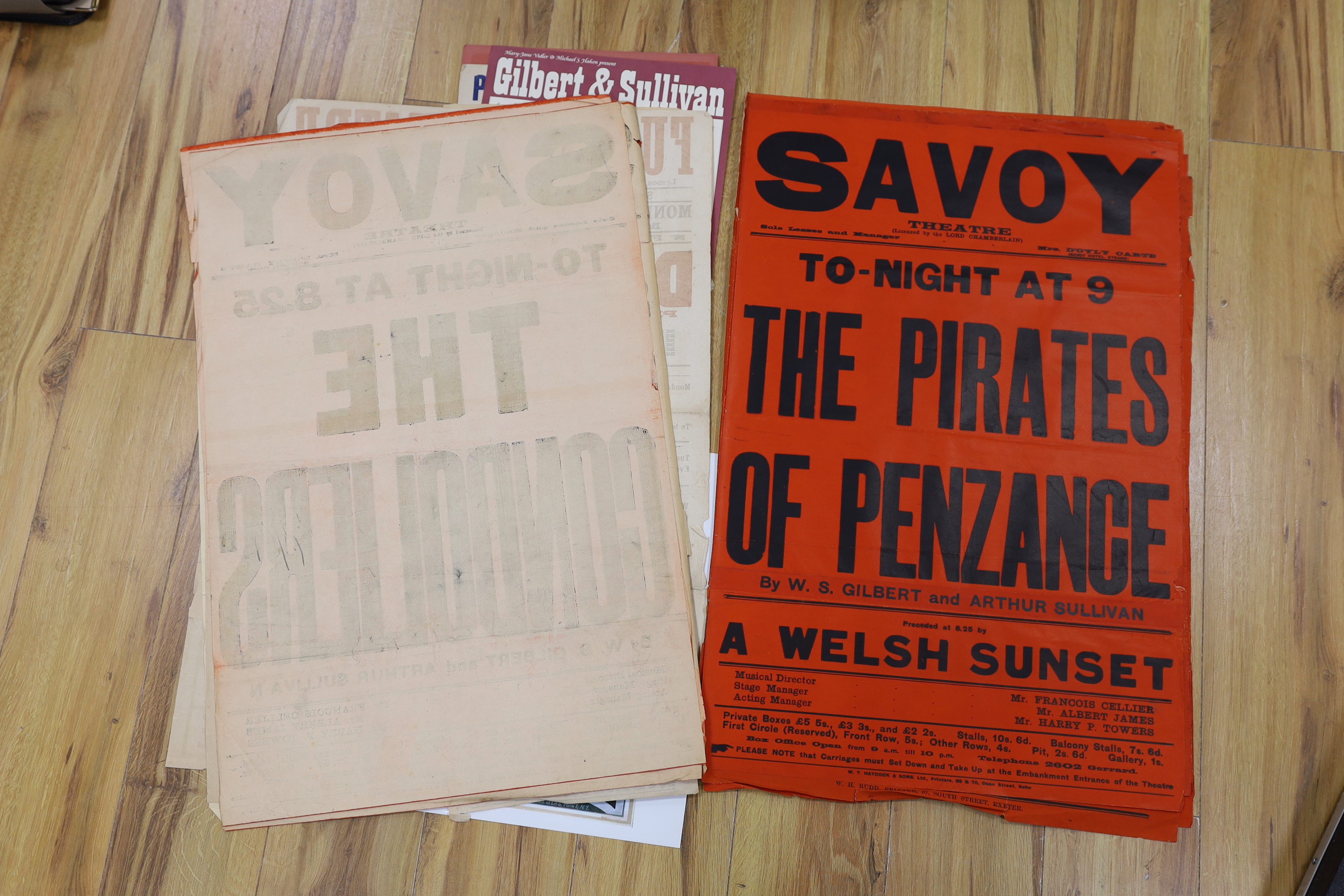 Gilbert & Sullivan and D’Oyly Carte interest; a folder of late 19th century/early 20th century lithograph posters and play bills advertising productions at the Savoy Theatre, King’s Theatre, Broadway Theatre, Fulham Thea